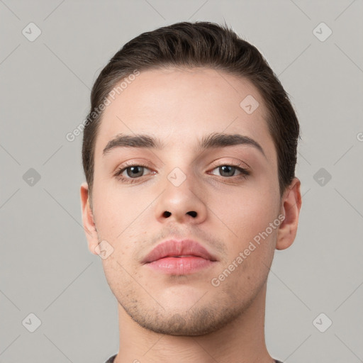 Neutral white young-adult male with short  brown hair and brown eyes