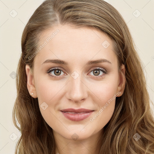 Joyful white young-adult female with long  brown hair and green eyes