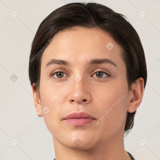 Neutral white young-adult female with short  brown hair and brown eyes