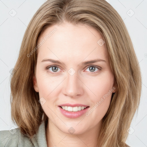 Joyful white young-adult female with medium  brown hair and blue eyes