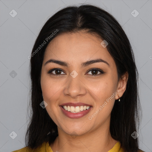 Joyful latino young-adult female with medium  brown hair and brown eyes