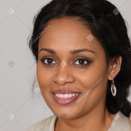 Joyful latino young-adult female with long  brown hair and brown eyes