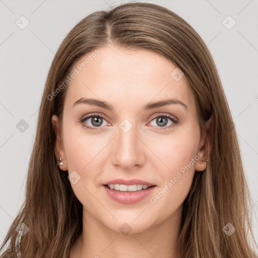 Joyful white young-adult female with long  brown hair and grey eyes