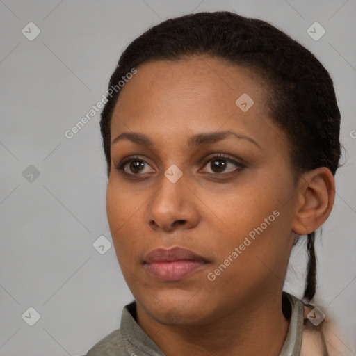 Neutral black young-adult female with short  black hair and brown eyes