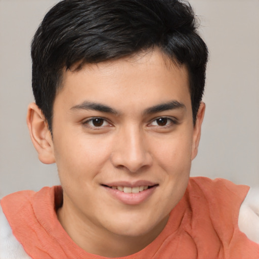 Joyful asian young-adult male with short  brown hair and brown eyes