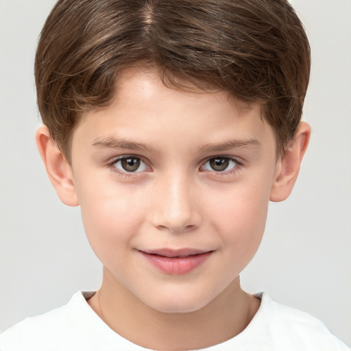 Joyful white child male with short  brown hair and brown eyes