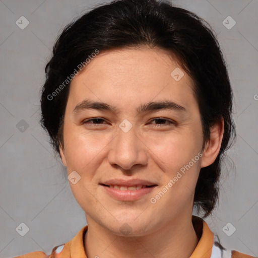 Joyful white adult female with medium  brown hair and brown eyes