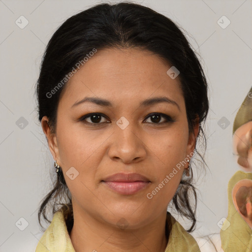 Joyful latino young-adult female with medium  brown hair and brown eyes