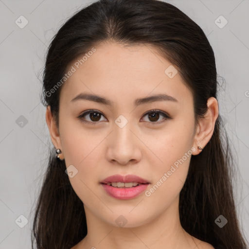 Joyful white young-adult female with long  brown hair and brown eyes