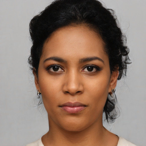 Neutral latino young-adult female with medium  black hair and brown eyes