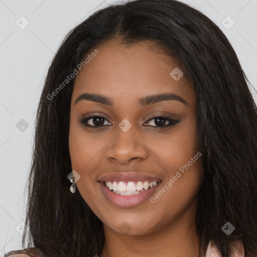 Joyful latino young-adult female with long  black hair and brown eyes