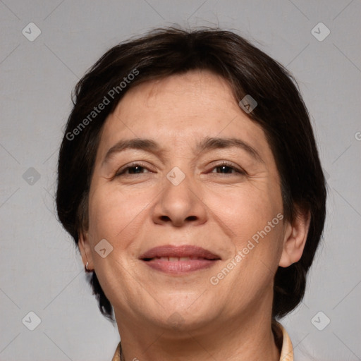 Joyful white adult female with medium  brown hair and brown eyes