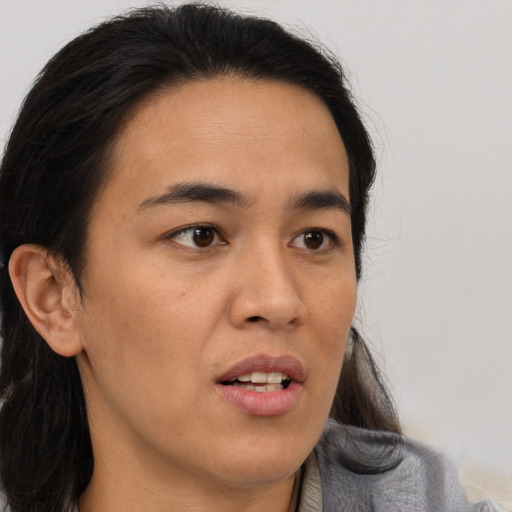 Neutral asian young-adult male with long  brown hair and brown eyes