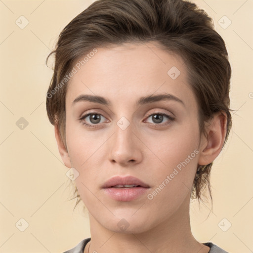 Neutral white young-adult female with medium  brown hair and brown eyes