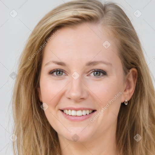 Joyful white young-adult female with long  brown hair and blue eyes