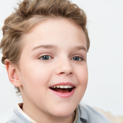 Joyful white child female with short  brown hair and blue eyes