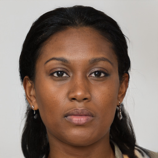 Neutral black young-adult female with medium  black hair and brown eyes