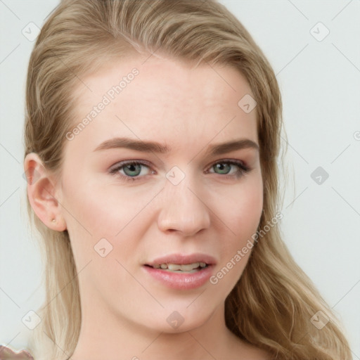 Joyful white young-adult female with long  brown hair and blue eyes