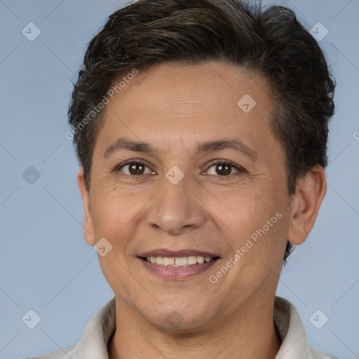 Joyful white adult male with short  brown hair and brown eyes