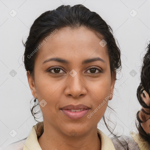 Joyful latino young-adult female with medium  brown hair and brown eyes