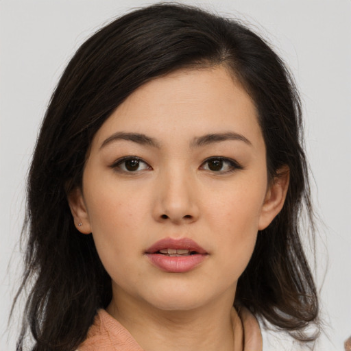 Neutral asian young-adult female with medium  brown hair and brown eyes