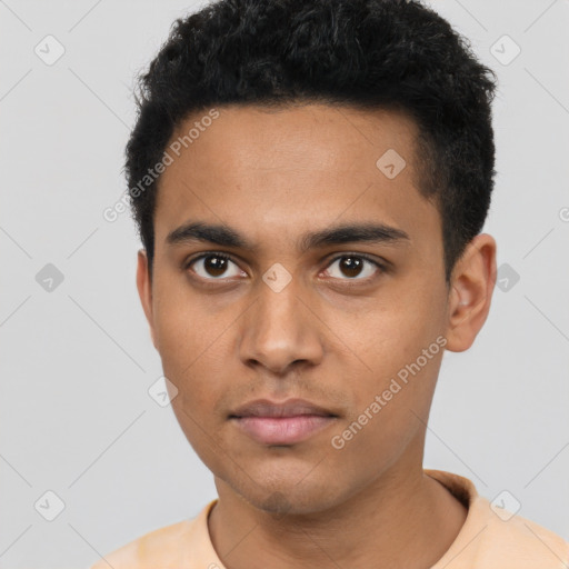 Neutral latino young-adult male with short  black hair and brown eyes