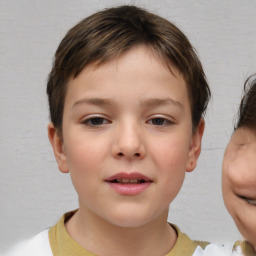 Joyful white child female with short  brown hair and brown eyes