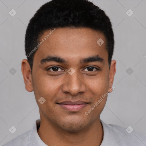 Joyful latino young-adult male with short  black hair and brown eyes