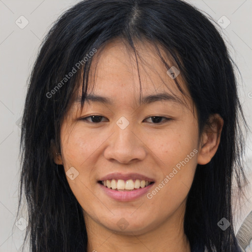 Joyful asian young-adult female with long  brown hair and brown eyes