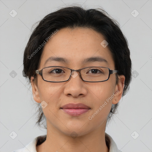 Joyful asian young-adult female with short  brown hair and brown eyes