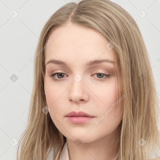 Neutral white young-adult female with long  brown hair and brown eyes