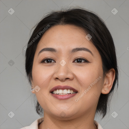 Joyful white young-adult female with medium  brown hair and brown eyes