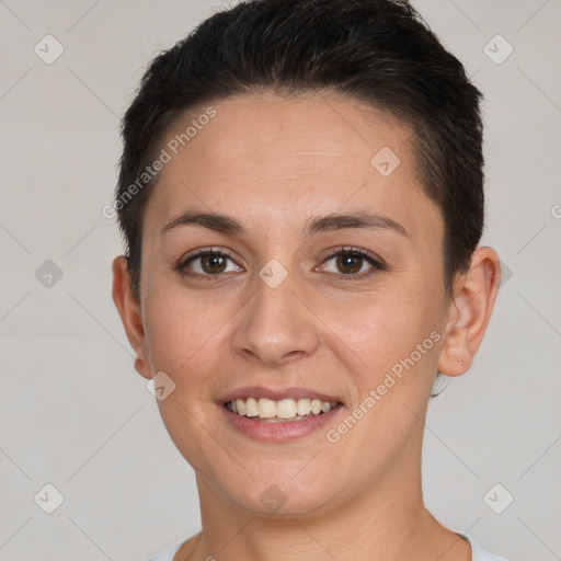 Joyful white young-adult female with short  brown hair and brown eyes