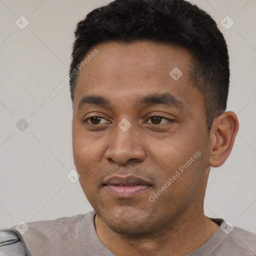 Neutral latino young-adult male with short  black hair and brown eyes
