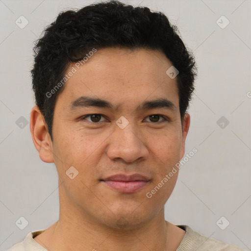 Joyful latino young-adult male with short  brown hair and brown eyes