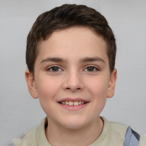 Joyful white child male with short  brown hair and brown eyes