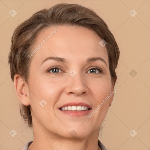 Joyful white adult female with short  brown hair and brown eyes