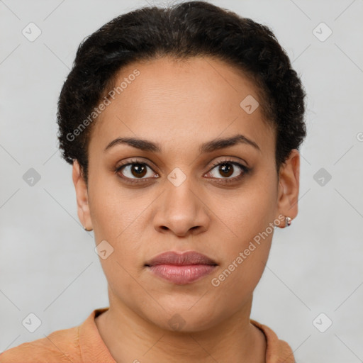 Joyful latino young-adult female with short  brown hair and brown eyes