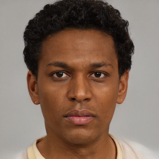 Neutral black young-adult male with short  brown hair and brown eyes