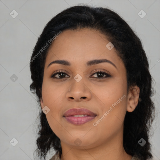 Joyful latino young-adult female with long  black hair and brown eyes