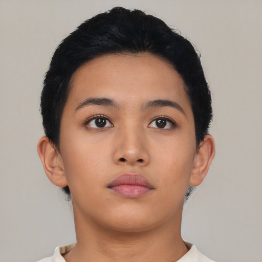 Neutral latino young-adult female with short  brown hair and brown eyes