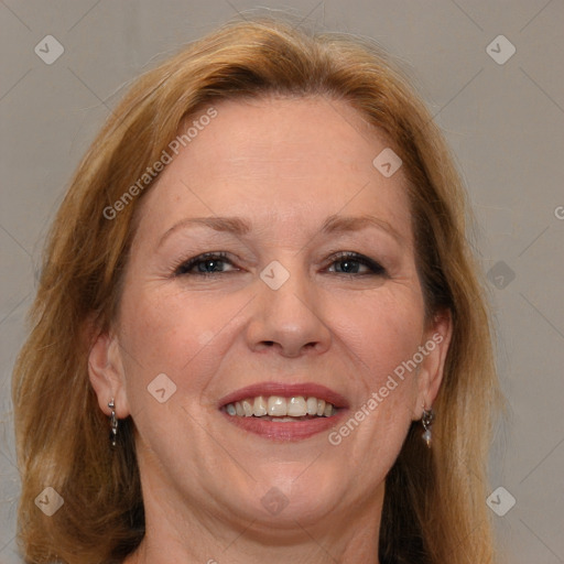 Joyful white adult female with medium  brown hair and brown eyes