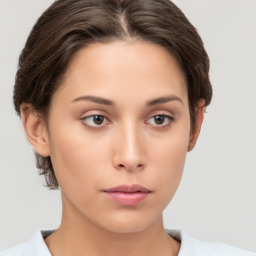 Neutral white young-adult female with short  brown hair and brown eyes