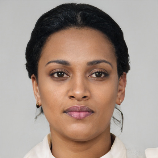Neutral latino young-adult female with short  black hair and brown eyes
