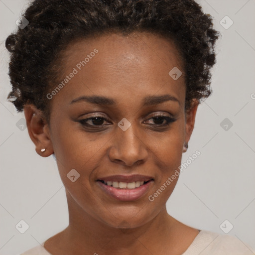 Joyful black young-adult female with short  brown hair and brown eyes