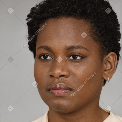 Neutral black young-adult female with short  brown hair and brown eyes