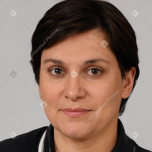 Joyful white adult female with short  brown hair and brown eyes