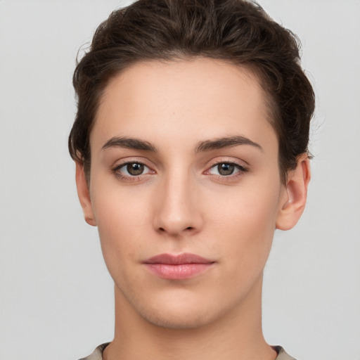 Neutral white young-adult female with short  brown hair and brown eyes