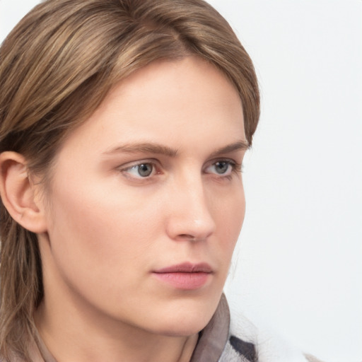 Neutral white young-adult female with medium  brown hair and grey eyes