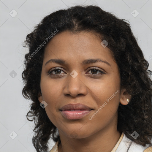 Joyful black young-adult female with medium  brown hair and brown eyes